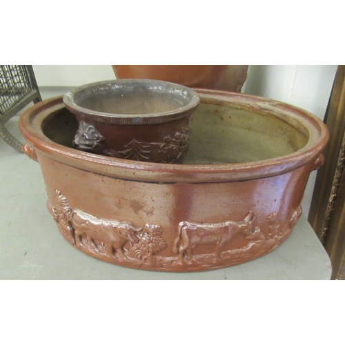 263 - Late 19thC stoneware: to include a salt glazed spirit barrel, decorated with a coat of arms  13... 