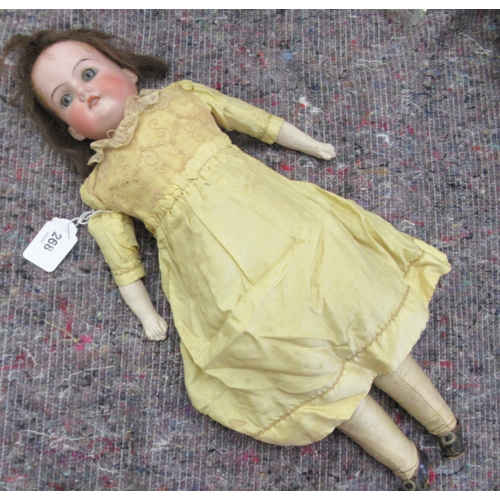 268 - An early 20thC Armand Marseille bisque head doll with painted features and fixed eyes and mobile lim... 