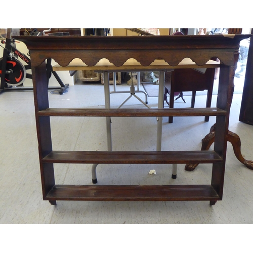 292 - Early 19thC oak furniture, viz. a three tier hanging shelf  35