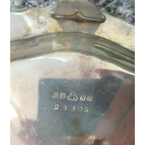 295 - A Georgian design silver plated salver with a wavy thumb moulded border, raised on splayed feet ... 