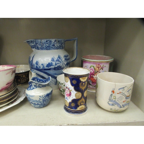 297 - 18th and 19thC British porcelain: to include a cream ware jug, decorated in blue and white 