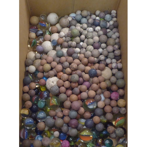 299 - Handblown and moulded marbles 