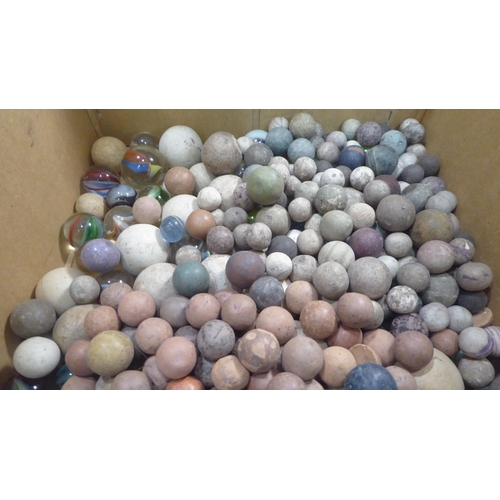 299 - Handblown and moulded marbles 