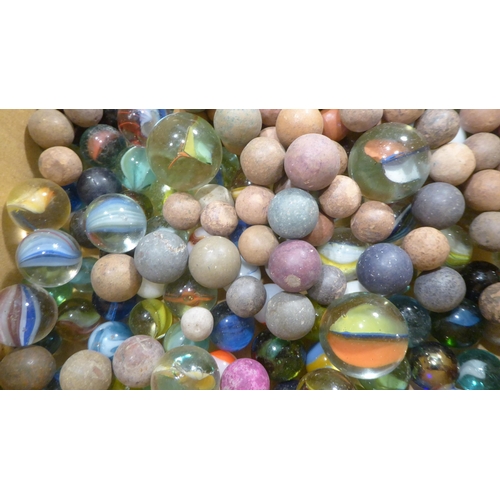 299 - Handblown and moulded marbles 