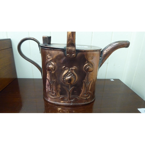 49 - An early 20thC Joseph Sankey & Sons maids, oval copper watering can, embossed in Art Nouveau tas... 