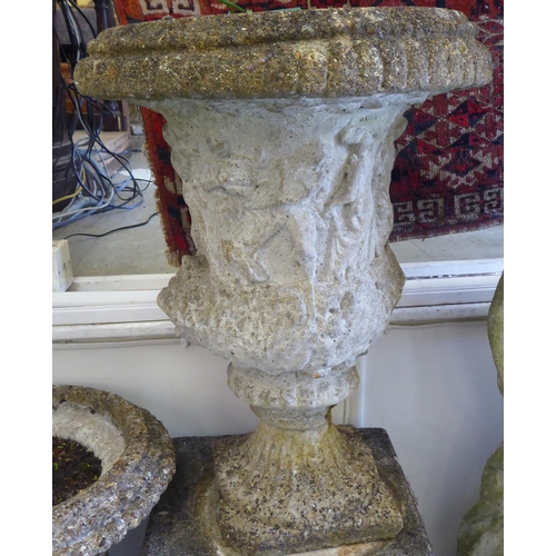 50 - A pair of composition stone terrace pedestal vases, each moulded with a frieze of figures  21