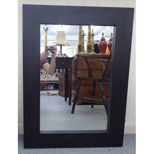 66 - Two modern mirrors, one in a gilt frame  34