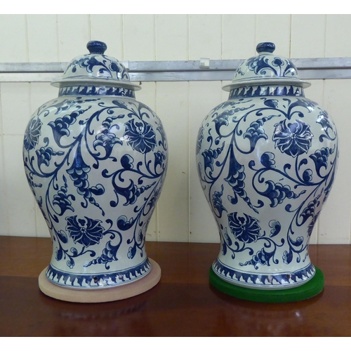 79 - A pair of modern Italian pottery, antique inspired vases of tapered, bulbous form  (with provis... 