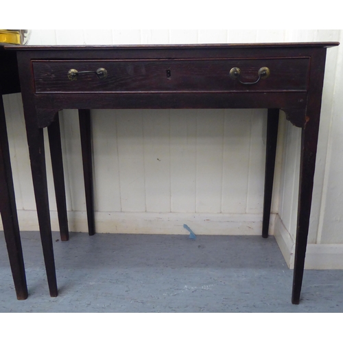 88 - A 19thC country made oak side table, the planked top over an apron drawer with cockbeading and brass... 