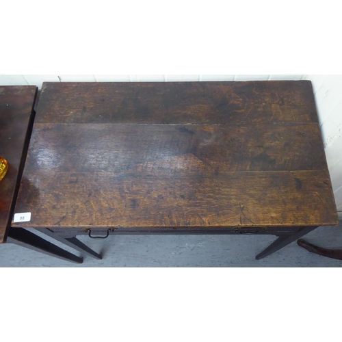 88 - A 19thC country made oak side table, the planked top over an apron drawer with cockbeading and brass... 