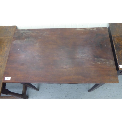 95 - A 19thC mahogany side table with a pair of inline frieze drawers, over a shaped apron, raised on squ... 