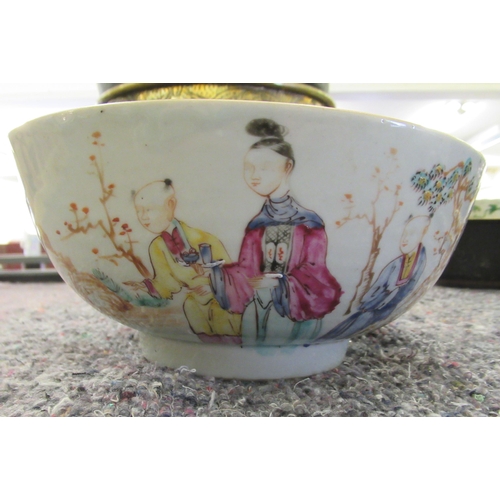 96 - A late 18thC Chinese porcelain bowl, decorated with figures in a landscape setting  7.75