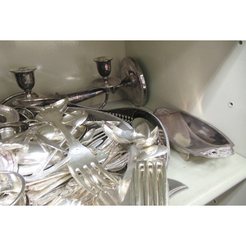 132 - Silver plated tableware: to include a pair of loaded twin branch candelabra  14