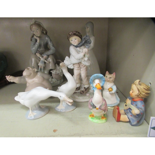 68 - Ceramic figures: to include examples by Lladro and Worcester  largest 8