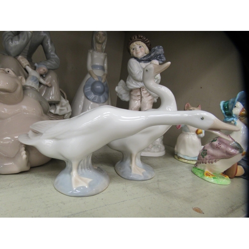 68 - Ceramic figures: to include examples by Lladro and Worcester  largest 8