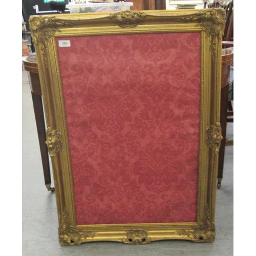 260 - A moulded gilt frame  20