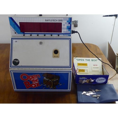 An electronically operated RaffleTech 3000 'Open the Box' machine with