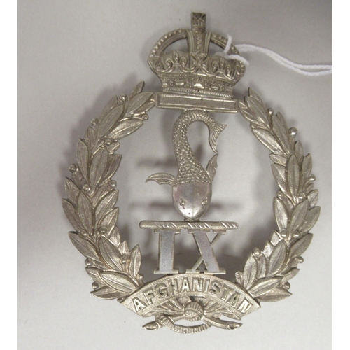 100 - An Indian military shoulder plate (Please Note: this lot is subject to the statement made in the Auc... 