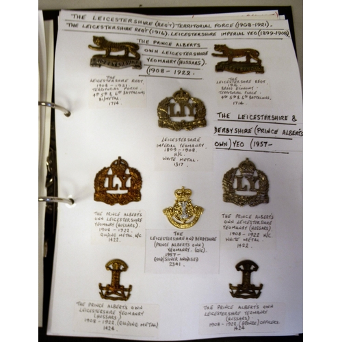 107 - An album collection of fully identified British military badges, some copies, comprising Leicester a... 