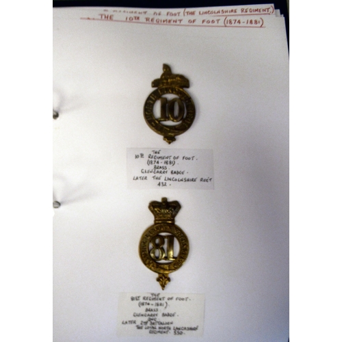 107 - An album collection of fully identified British military badges, some copies, comprising Leicester a... 