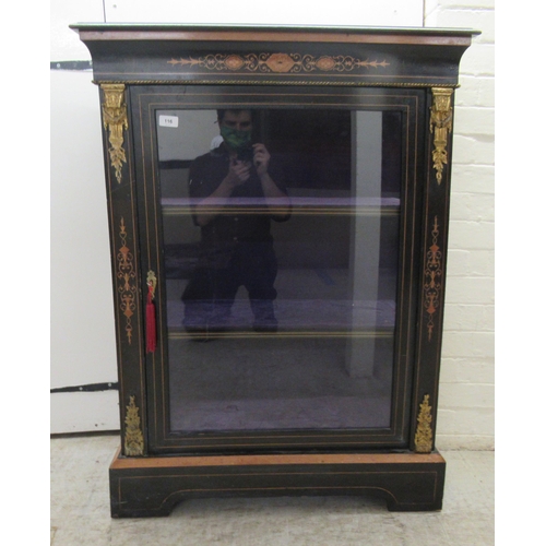 116 - A late 19thC ebonised and marquetry pier cabinet with cast gilt metal mounts, glazed, panelled sides... 