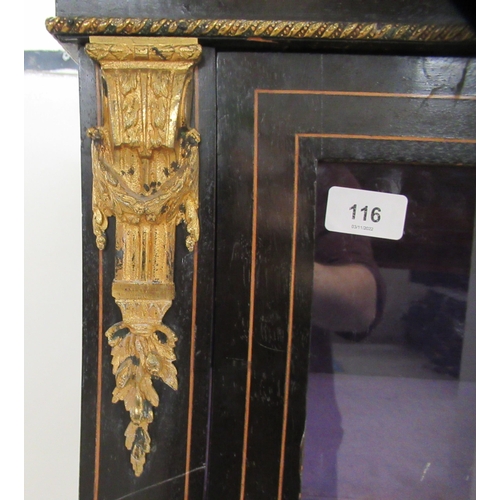 116 - A late 19thC ebonised and marquetry pier cabinet with cast gilt metal mounts, glazed, panelled sides... 