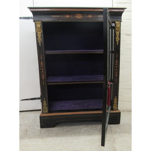 116 - A late 19thC ebonised and marquetry pier cabinet with cast gilt metal mounts, glazed, panelled sides... 