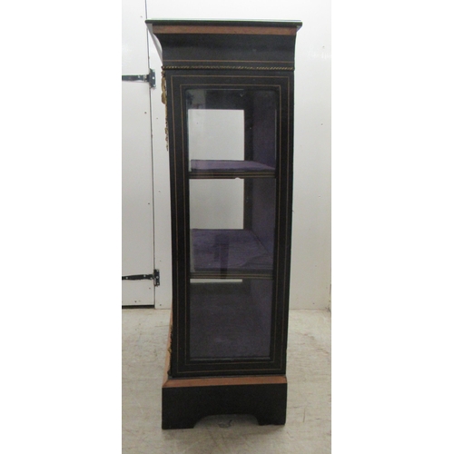 116 - A late 19thC ebonised and marquetry pier cabinet with cast gilt metal mounts, glazed, panelled sides... 