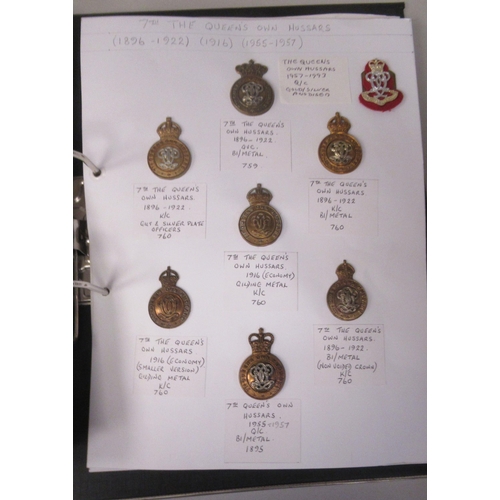 165 - An album collection of fully identified British military badges, some copies: to include 3rd King's ... 