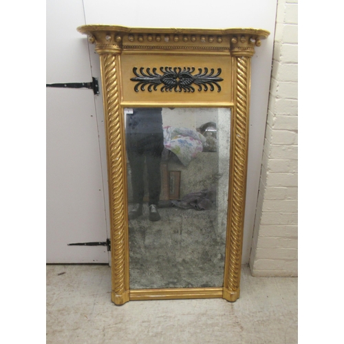 3 - A late Regency pier glass, set in an inverted breakfront, carved giltwood frame with ball ornament a... 