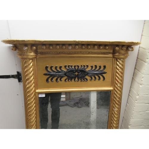 3 - A late Regency pier glass, set in an inverted breakfront, carved giltwood frame with ball ornament a... 