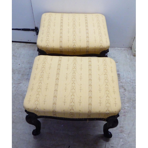 4 - A pair of mid 19thC rosewood framed stools with stud upholstered, old gold coloured fabric tops, rai... 