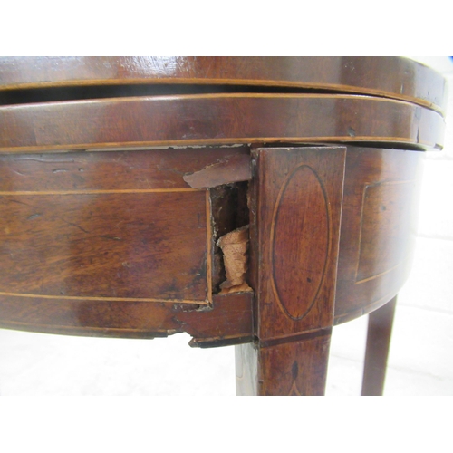 60 - An early 19thC mahogany and crossbanded satinwood D-shape tea table, the rotating foldover top raise... 