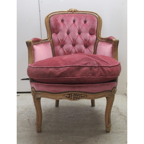 86 - A modern Louis XV inspired, stained and carved beech, showwood framed boudoir chair with enclosed ar... 