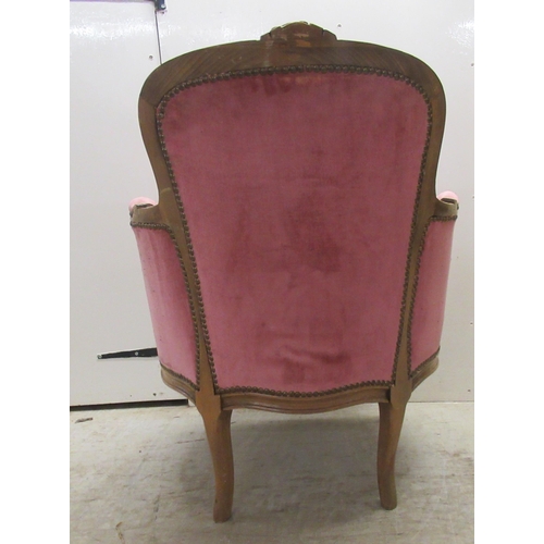 86 - A modern Louis XV inspired, stained and carved beech, showwood framed boudoir chair with enclosed ar... 