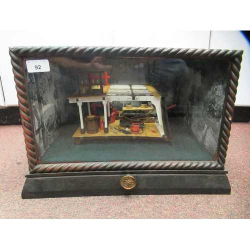 92 - A table top diorama, featuring a section of a warship's gun deck with attendant equipment, rotating ... 