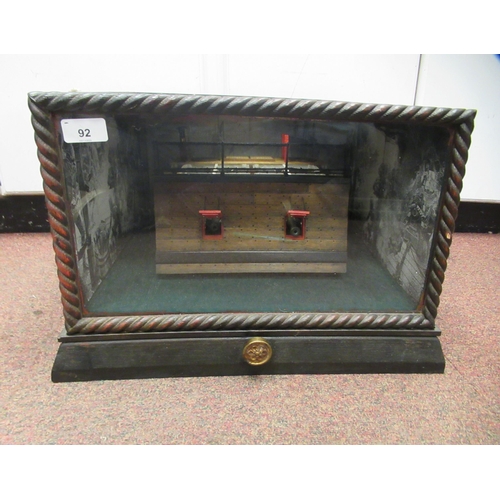 92 - A table top diorama, featuring a section of a warship's gun deck with attendant equipment, rotating ... 