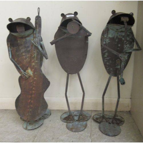 113 - Three modern steel and wrought iron cartoon frogs, jazz musicians, on lilypad stands  approx. 26