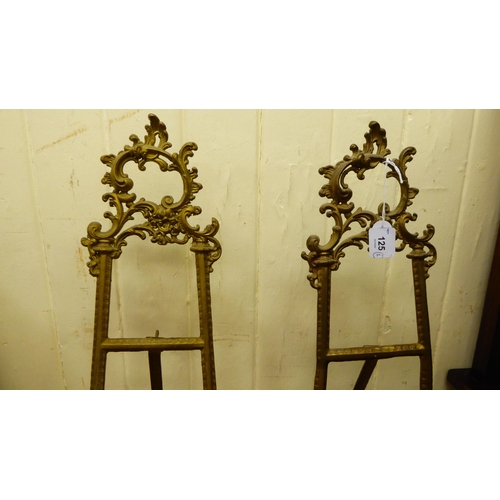 125 - A pair of Victorian style cast brass, table top, easel stands, decorated with C-scrolls and foliate ... 