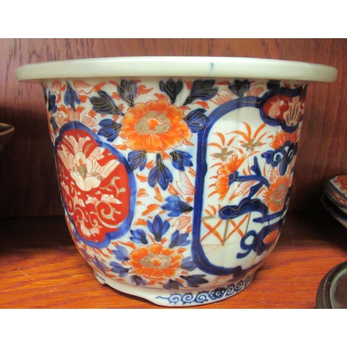 128 - Oriental ceramics: to include an early 20thC Japanese Imari porcelain; modern Chinese porcelain; and... 