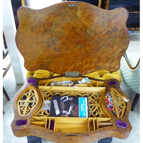 184 - A late Victorian walnut serpentine front sewing table, the hinged lid enclosing a fitted interior, r... 