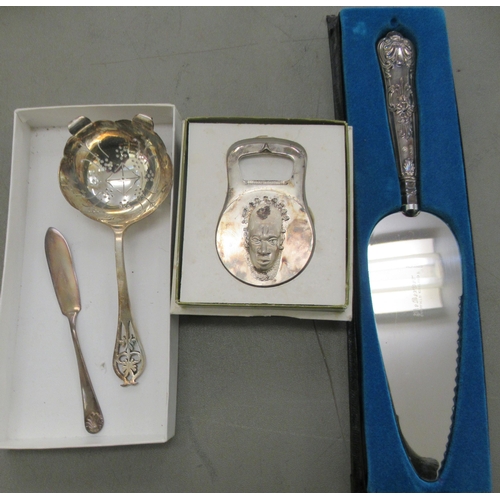 195 - Silver and silver plate: to include a silver tea strainer  indistinct marks 