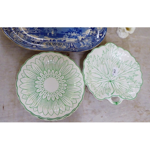 216 - Ceramics: to include a seven piece Wedgwood cream glazed and green china foliate pattern fruit plate... 