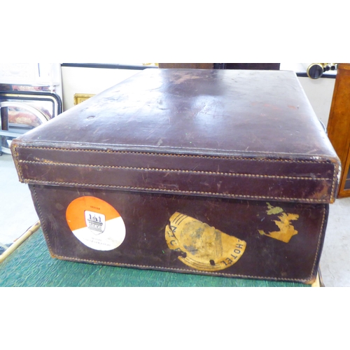 222 - A mid 20thC moulded and stitched chocolate brown hide suitcase   7