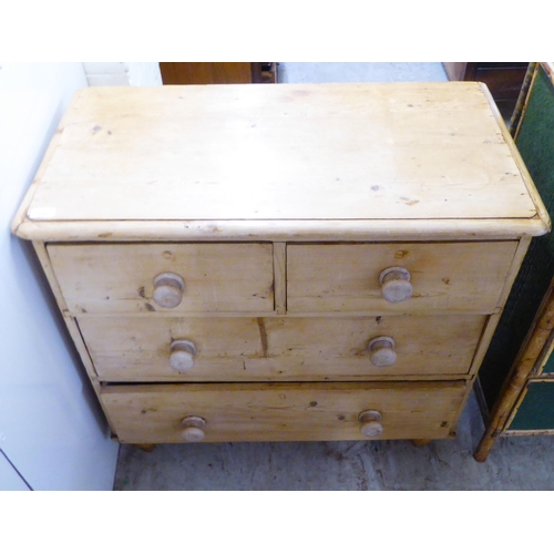 226 - An early 20thC bleached pine dressing chest, the two short/two long drawers with bun handles, raised... 