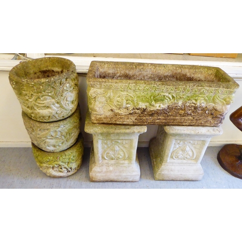 234 - Stone terrace pedestal and planters: to include one 10