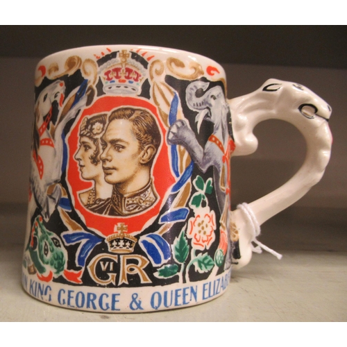 241 - A Burleigh Ware Coronation mug, designed by Dame Laura Knight, celebrating The Coronation of King Ge... 