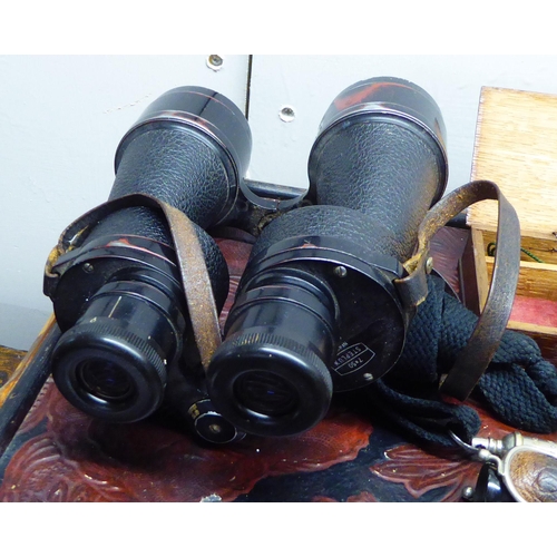 246 - Optical equipment: to include a Temron camera 200m lens; and a pair of Ross 7x50 binoculars 