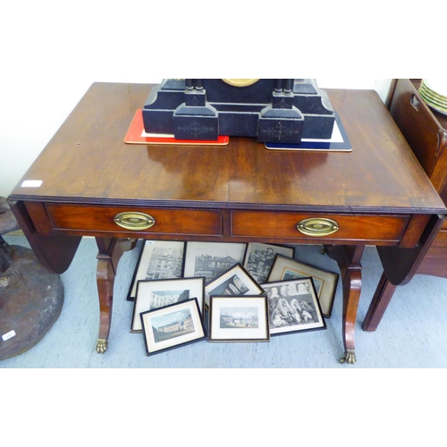 262 - A Regency mahogany sofa table with two frieze drawers, raised on opposing uprights and splayed legs&... 