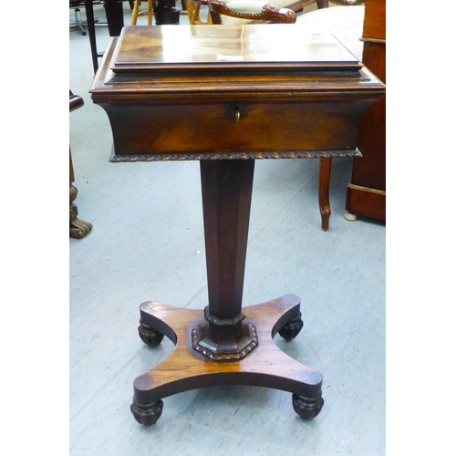 269 - A Regency rosewood teapoy, the removable top enclosing four caddies, over an octagonal tapered platf... 